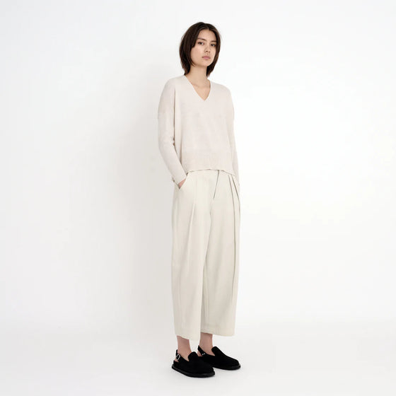 7115 by Szeki off-white merino wool  V-neck sweater found at Patricia in Southern Pines, NC