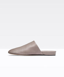  Vince Oren Italian leather backless flat with a sleek body, rounded closed toe and slight demi wedge.