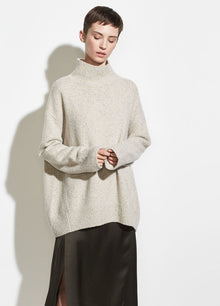  Vince buttermilk oversized turtleneck sweater found at Patricia in Southern Pines, NC